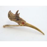 A 21stC novelty letter clip of bird head form. Approx. 5" long Please Note - we do not make