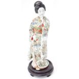 A ceramic figure modelled as a Japanese lady. Approx. 17" high Please Note - we do not make