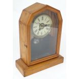 An early 20thC mantel alarm clock. Approx. 14 1/2" high x 11" wide x 4 1/2" deep Please Note - we do