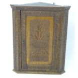 A 19thC mahogany corner cupboard with carved decoration. Approx. 30 1/2" high Please Note - we do