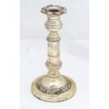 A 20thC silver plated candlestick. Approx. 8 1/2" high Please Note - we do not make reference to the