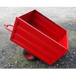 A garden tipper trailer. The interior approx. 40 1/2" long x 30 1/4" wide x 22" deep Please Note -