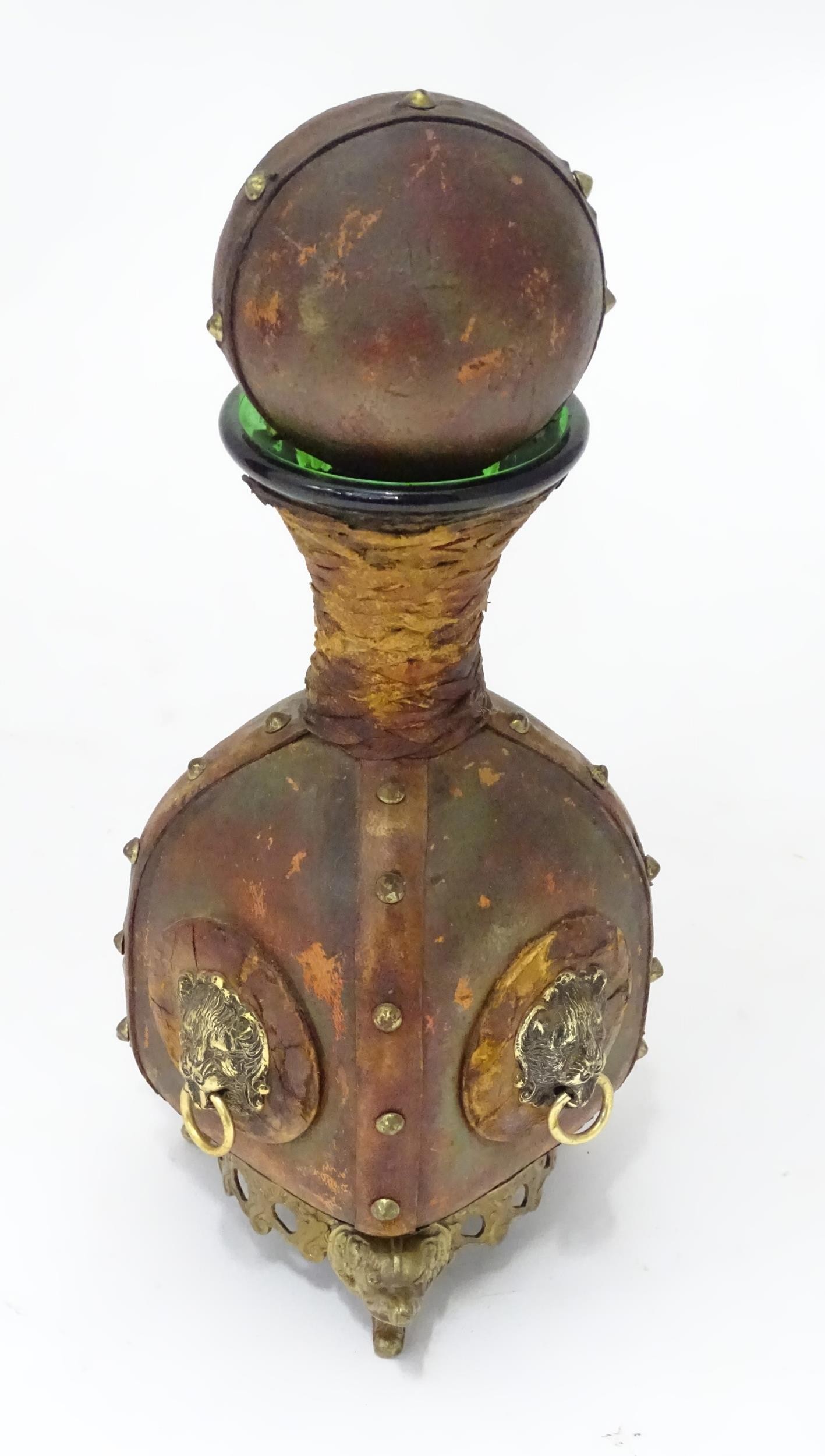 A green glass decanter / carafe with leather wrap cover with stud detail and and lions mask handle - Image 3 of 4