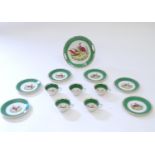 A quantity of Booths style tea wares with green borders and exotic bird decoration, to include tea