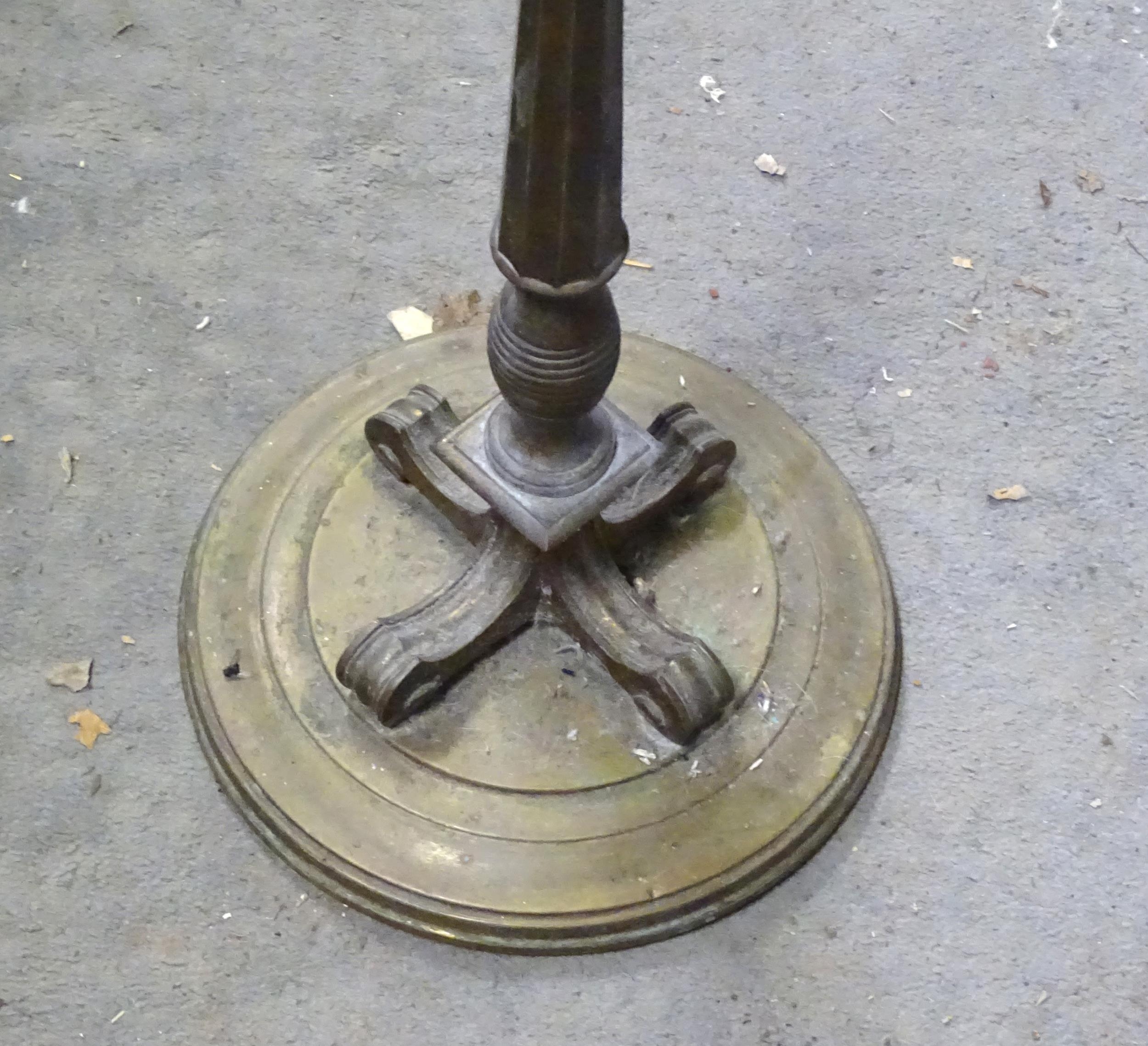 A weighted brass standard lamp with a circular base. Approx. 63" high Please Note - we do not make - Image 3 of 3