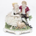 A Continental figure group modelled as a seat young couple and a sheep, the lady with a lace dress