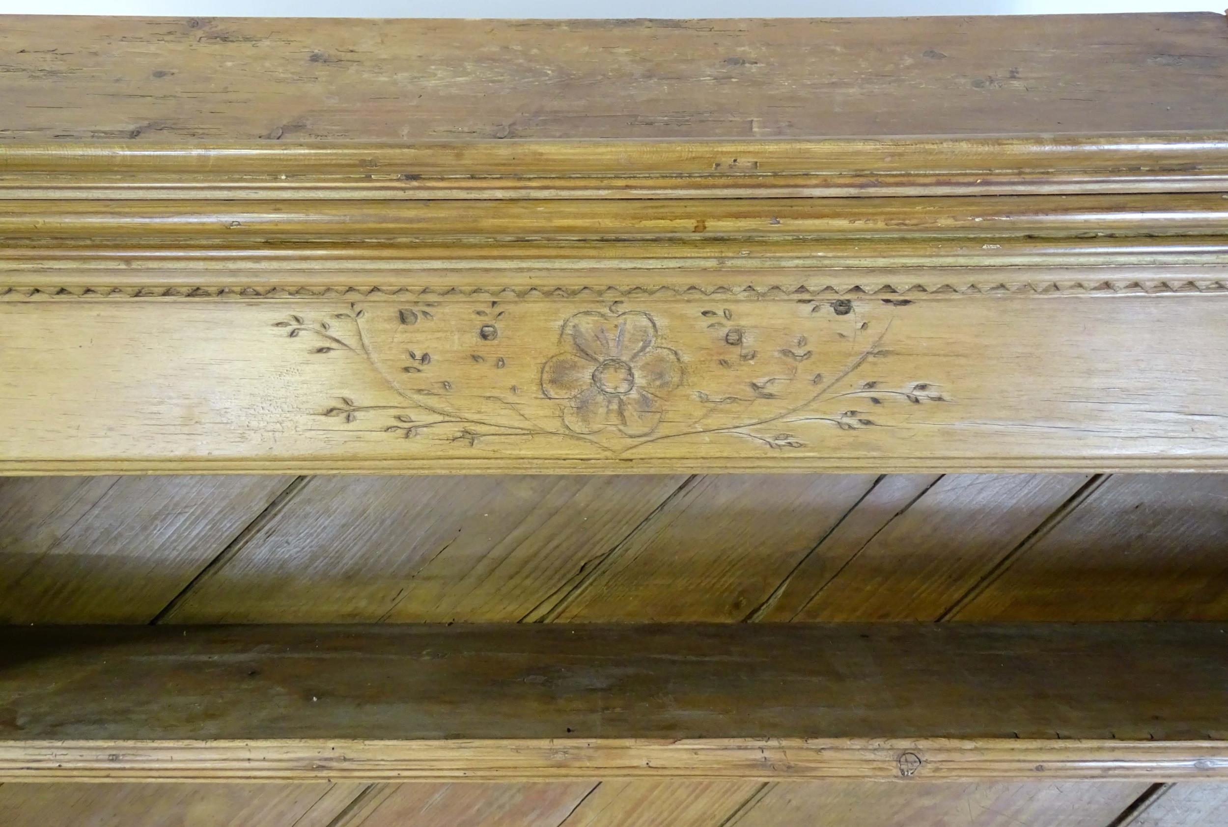 A 20thC pine dresser with a moulded cornice above floral carving flanked by reeded pilaster - Image 8 of 10