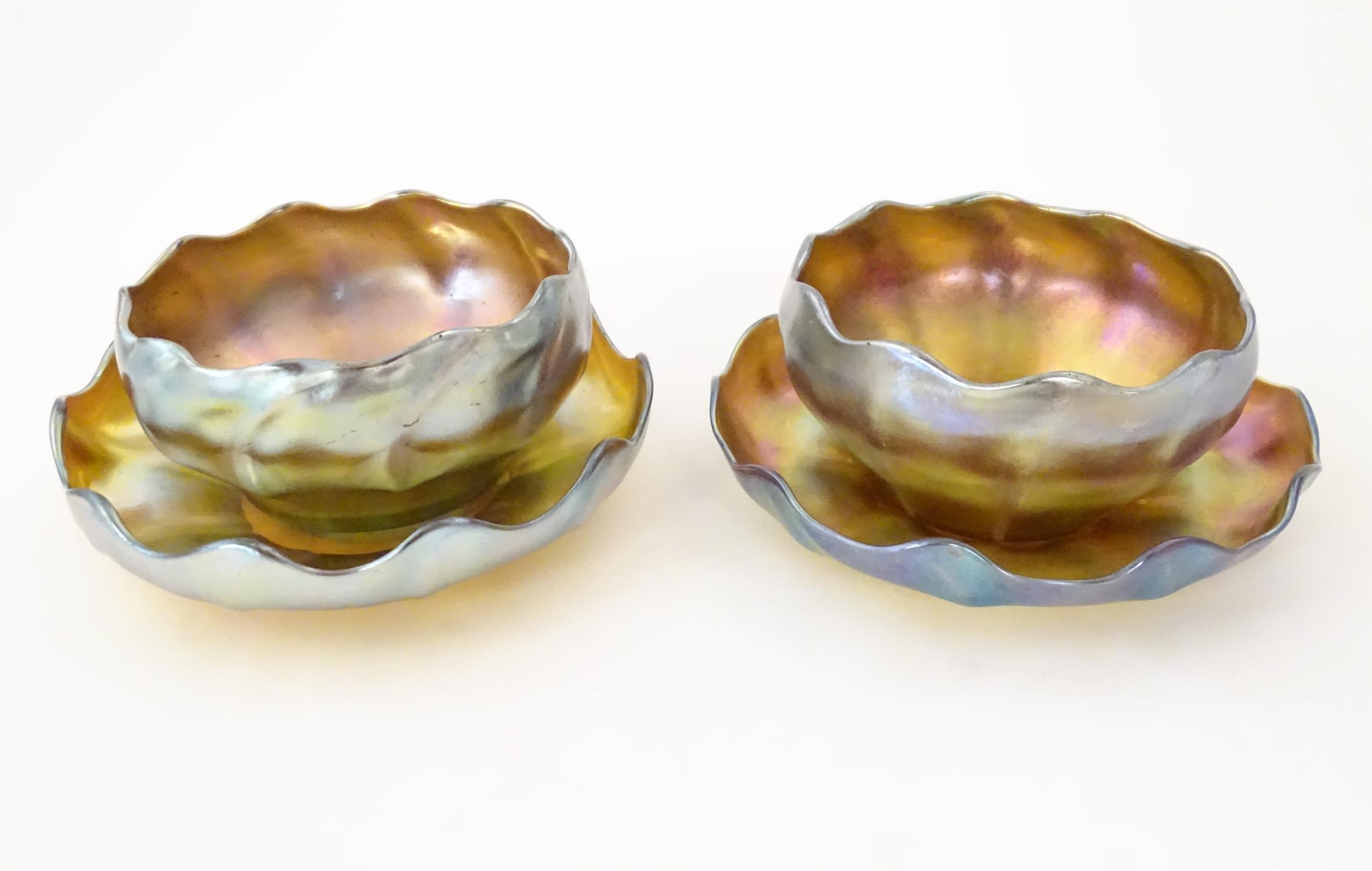 Tiffany Glass : Two Louis Comfort Tiffany Favrile glass finger bowls and stands. Signed under 'L.C.T