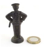 A late 19th / early 20thC cast copper pipe tamper modelled as an officer figure. Approx. 2 1/2" high