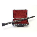 Musical Instrument: a Yamaha 26II clarinet, in fitted ABS case. Approx. 26 3/4" long Please Note -