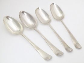 Four silver table spoons, two hallmarked London 1766, maker F. M., two hallmarked London 1774, maker