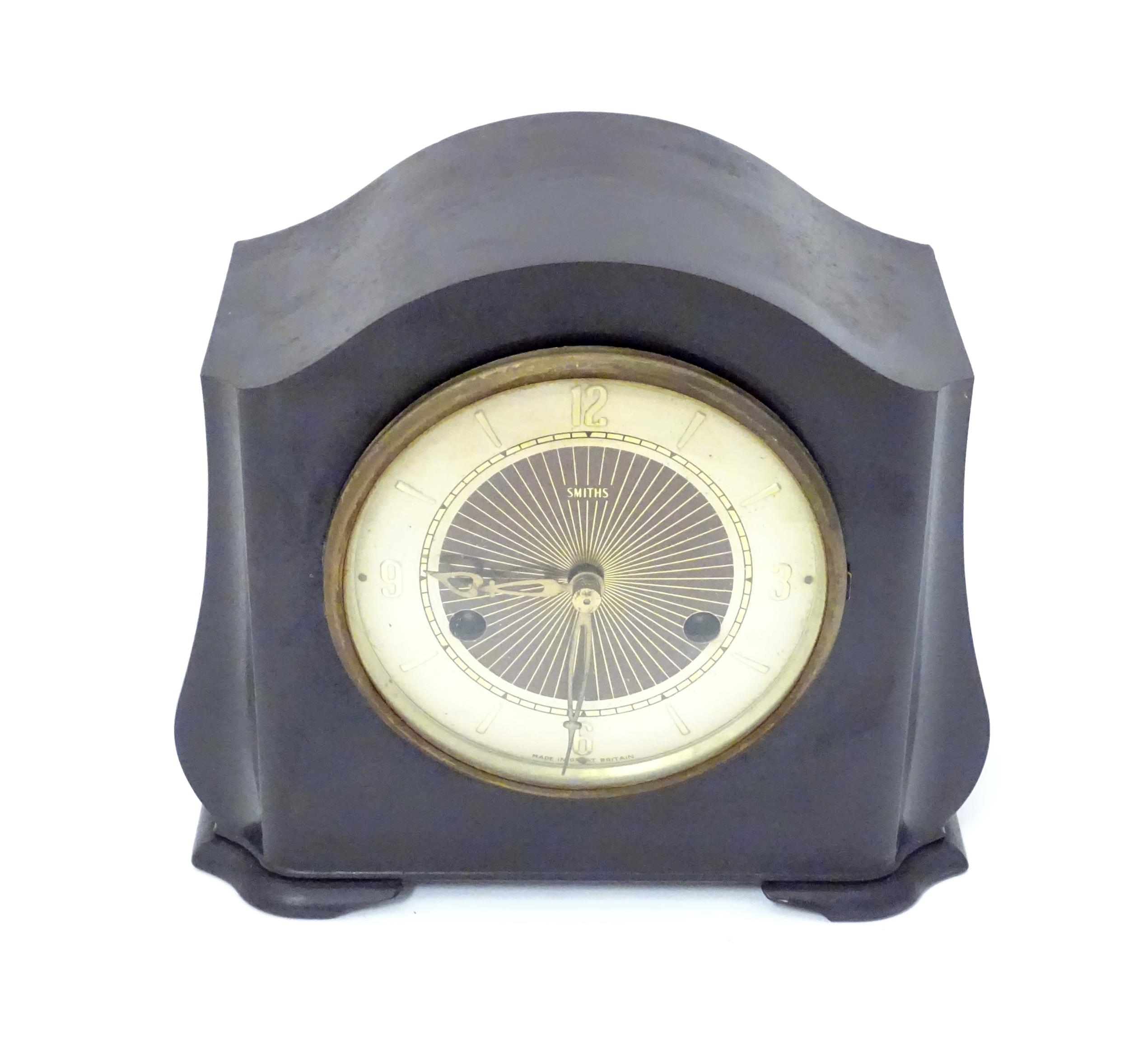 A Bakelite cased mantel clock by Smiths. 7 1/4" high Please Note - we do not make reference to the - Image 3 of 13