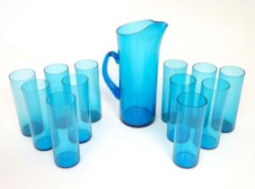 A retro kingfisher turquoise blue coloured glass lemonade set comprising jug and 12 glasses. In