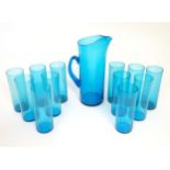 A retro kingfisher turquoise blue coloured glass lemonade set comprising jug and 12 glasses. In