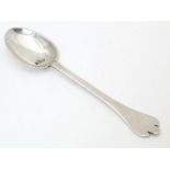 A Victorian Britannia standard silver teaspoon with trefid finial, hallmarked London 1897 with