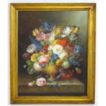 Manner of Thomas Webster, 20th century, Oil on board, A still life study of flowers in a pedestal