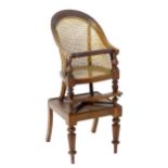 A mid 19thC mahogany Gillows style bergere childs chair on stand, with a bowed back and caned