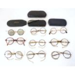 A quantity of early 20thC spectacles / glasses, comprising nine pairs of tortoiseshell / faux