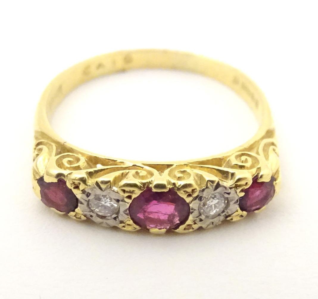 An 18ct gold ring set with diamonds and rubies in a linear setting. Ring size approx. U 1/2 Please - Image 2 of 7