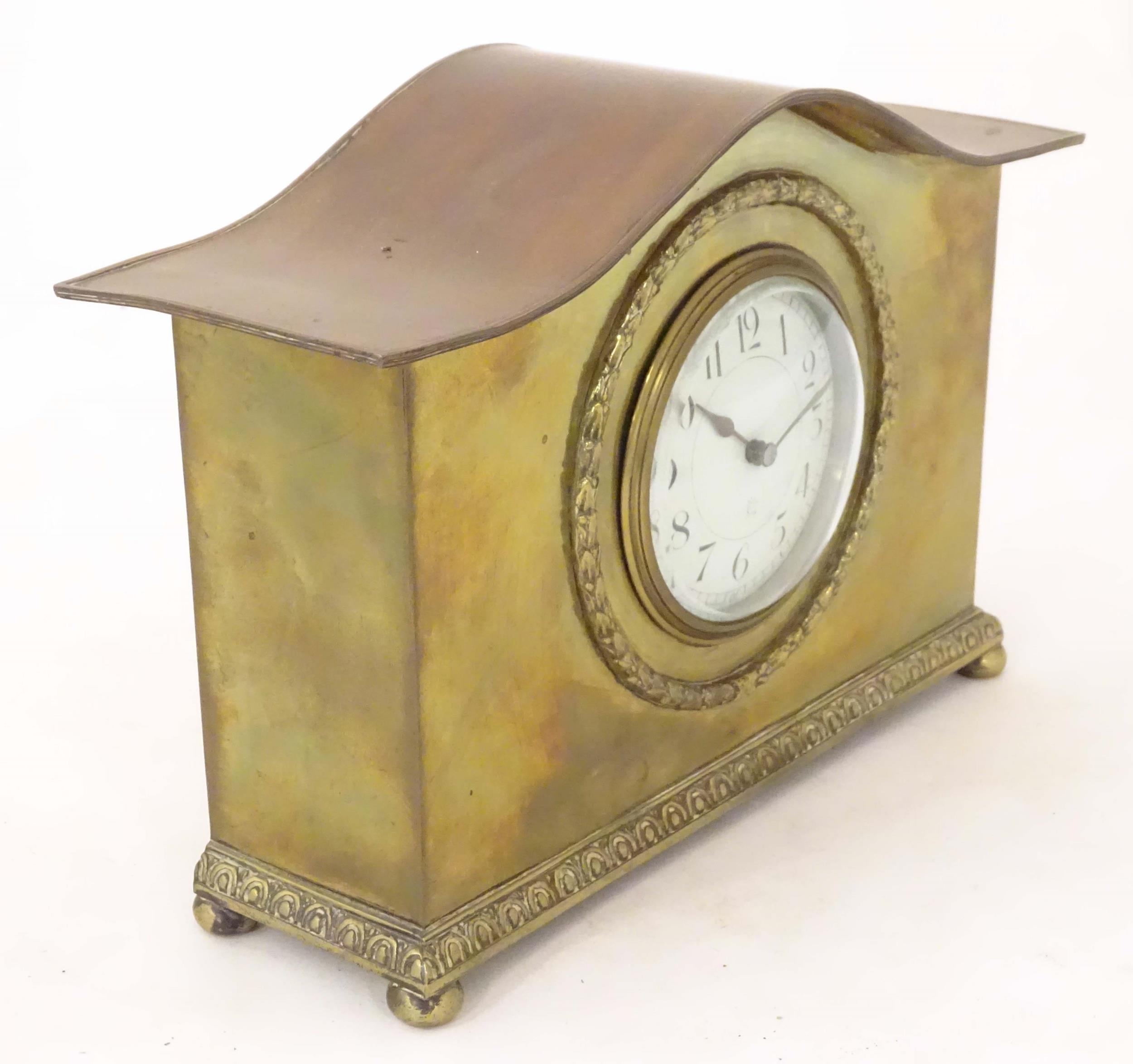 A mantle clock by Japy freres the shaped brass case with enamel dial marked signed Japy freres mark. - Image 2 of 18