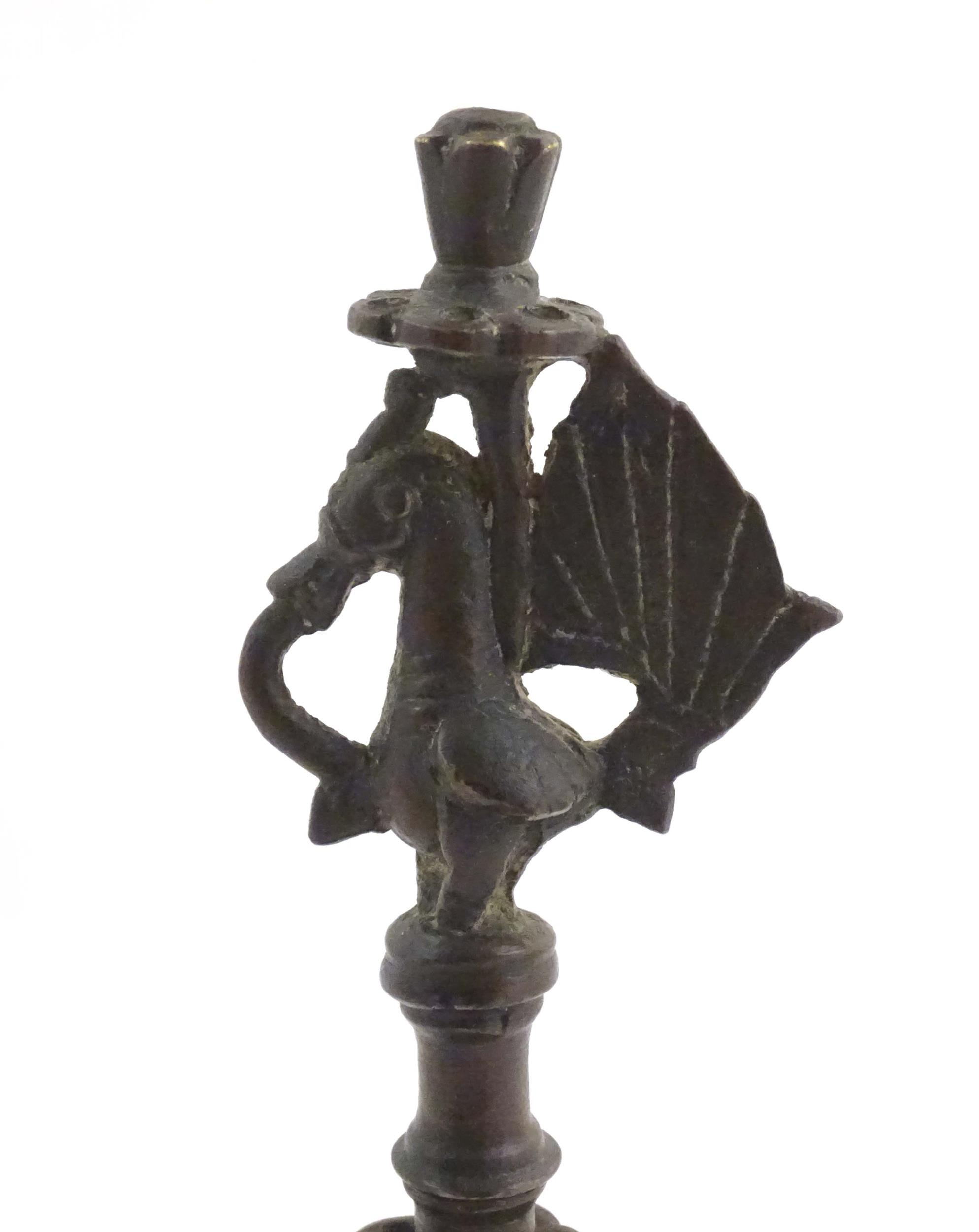 An Indian / Deccan cast temple style oil lamp with turned column surmounted by a Hamsa bird. Approx. - Image 2 of 8