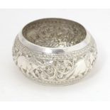 A white metal napkin ring with elephant and acanthus decoration. Probably Indian. Please Note - we