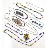 A quantity of assorted necklaces to include examples set with Venetian glass beads, etc. Please Note