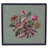 An early 20thC beadwork picture depicting flowers and foliage. Approx. 12 1/4" x 13" Please Note -