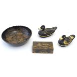 Four Oriental items comprising a papier mache lacquered bowl with scalloped edge, decorated with