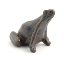 A cold painted bronze model of a seated frog. Approx. 1 1/4" high Please Note - we do not make