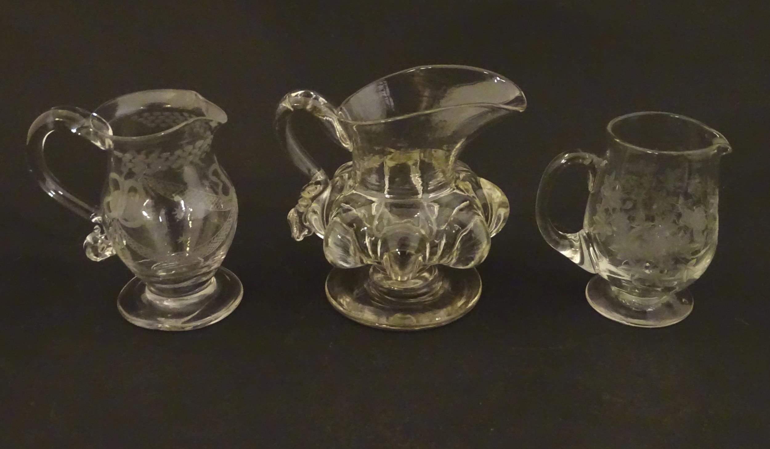 Three various 19thC and later cream jugs. The tallest 4" high Please Note - we do not make reference