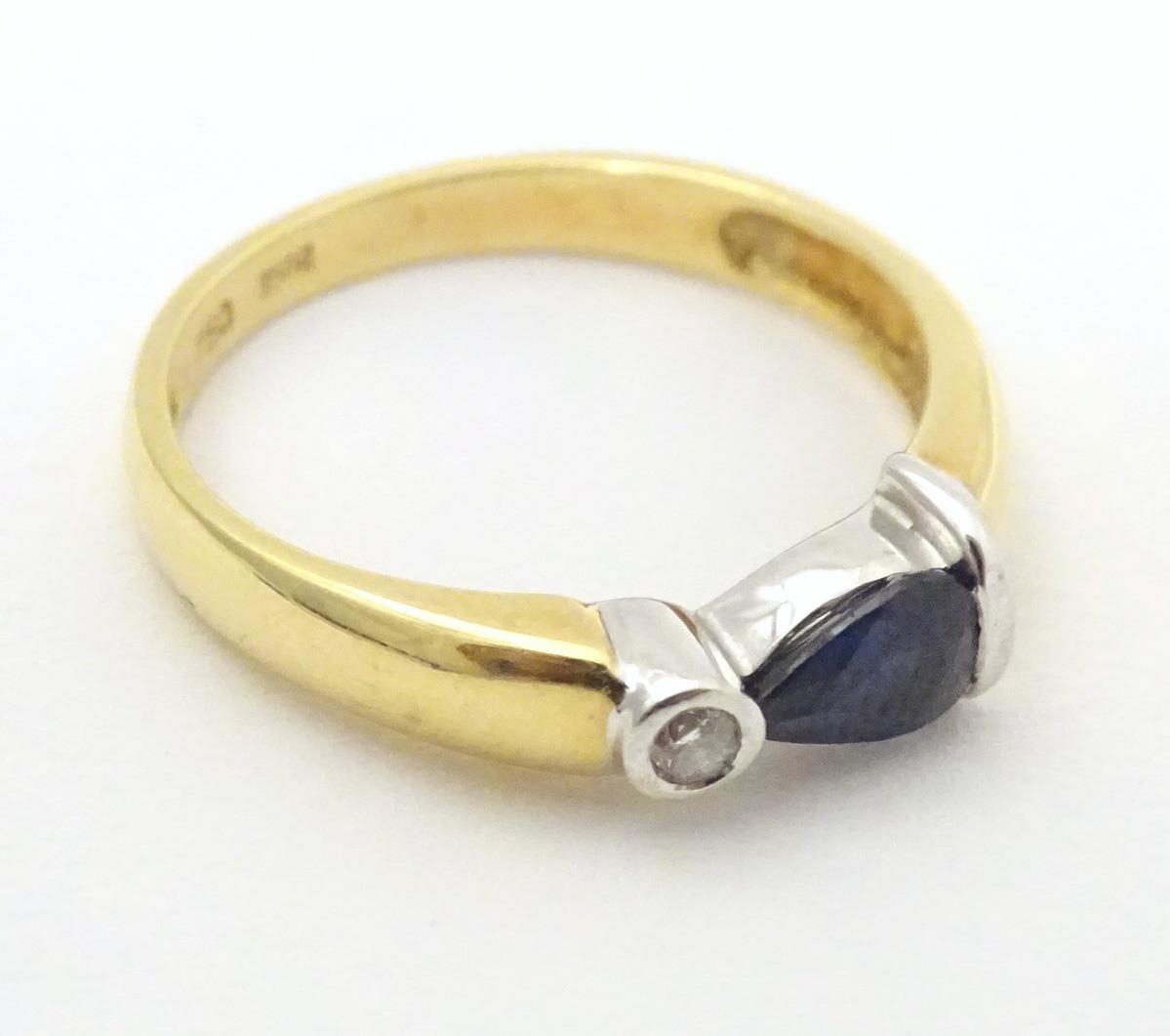 An 18ct gold ring set with sapphire and diamond. Ring size approx. L Please Note - we do not make - Image 4 of 6