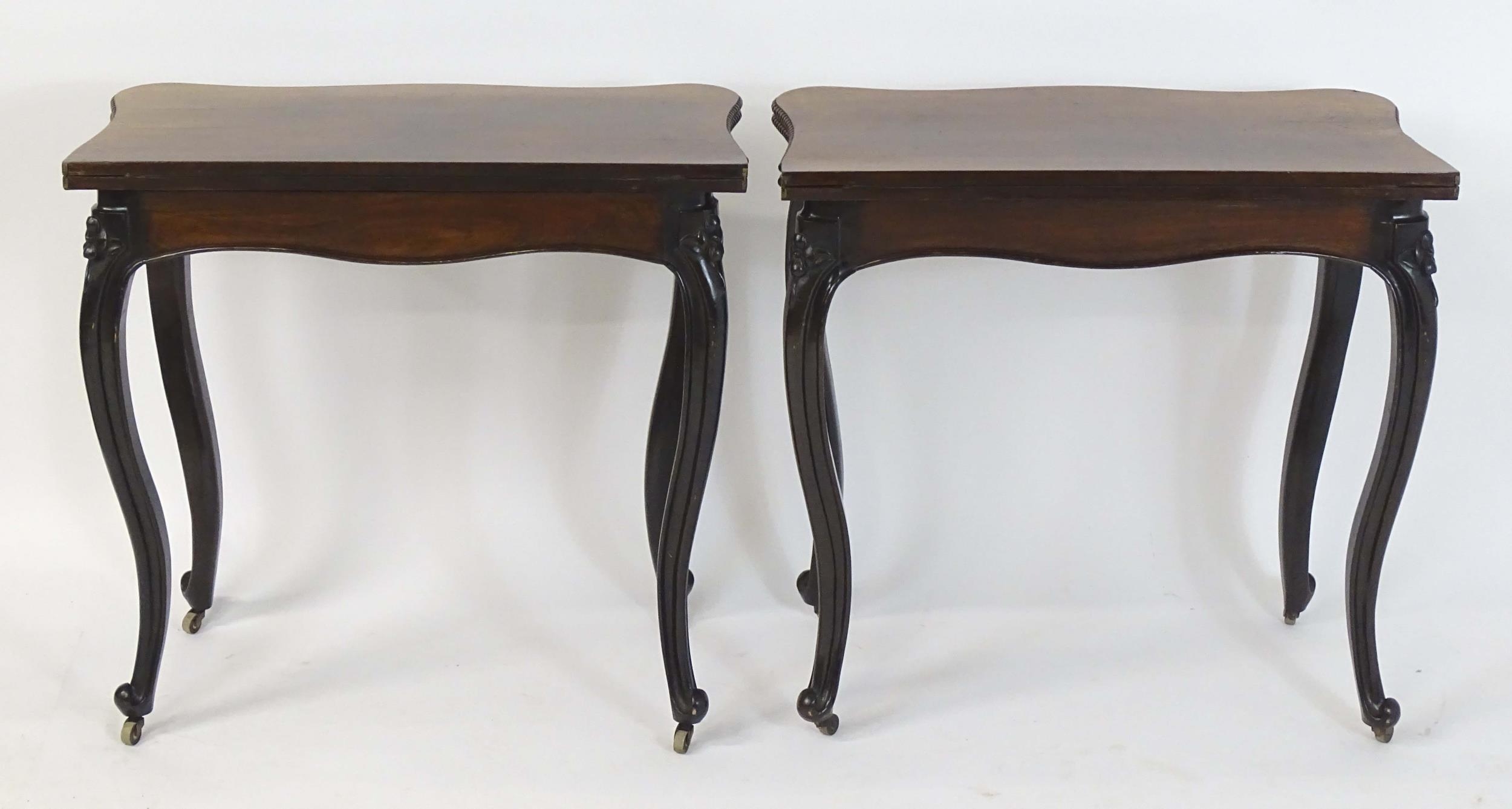 A pair of 19thC rosewood card tables of serpentine form, having beaded edges above floral carved - Image 18 of 18