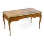 A C.1900 Louis XV style rosewood and tulipwood veneered bureau plat by Mercier Frères, This