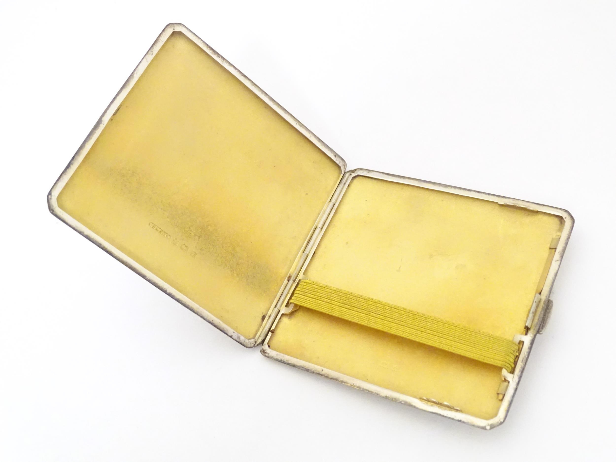 A silver cigarette case with engine turned decoration and gilded interior, hallmarked Birmingham - Image 6 of 10