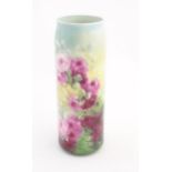 A Lenox Belleek cylindrical vase with floral rose decoration. Marked under. Approx. 11" high