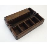 A late 19th / early 20thC wooden tool / work box with various compartments, a lidded sections and