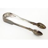 Victorian silver fiddle pattern sugar tongs hallmarked London 1843, maker R. W. Approx. 5 1/2"
