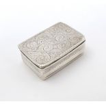 A silver pill box with engraved decoration, hallmarked Sheffield 2002, maker Carrs of Sheffield Ltd.