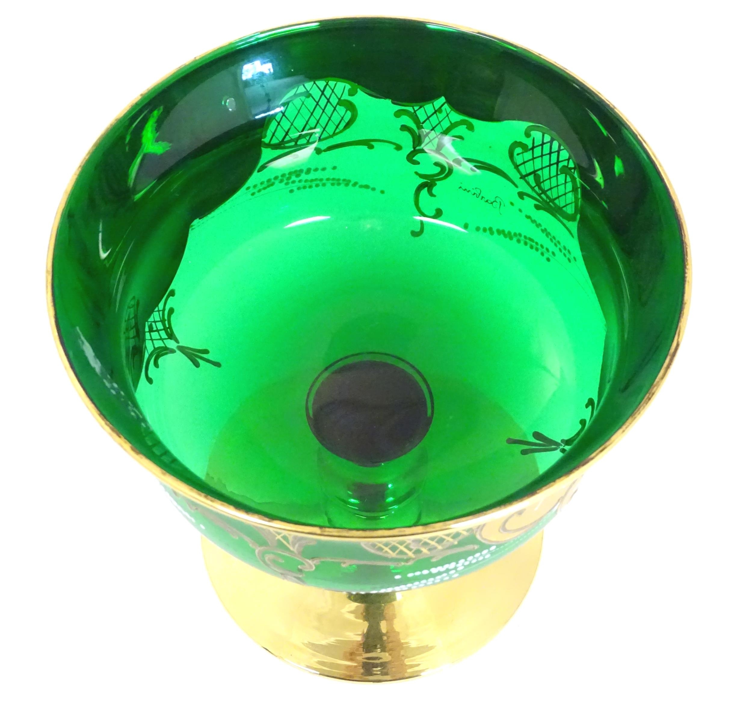 A Bohemian green glass pedestal bowl with gilt and enamel floral detail. Approx. 7" high x 7 1/2" - Image 5 of 8