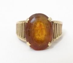 A 9ct gold retro ring set with citrine, hallmarked London 1958, maker HGM. Ring size approx. M 1/2