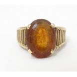 A 9ct gold retro ring set with citrine, hallmarked London 1958, maker HGM. Ring size approx. M 1/2