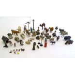 Toys: A quantity of lead farm and zoo animals, many by Britains Ltd., together with a kennel,