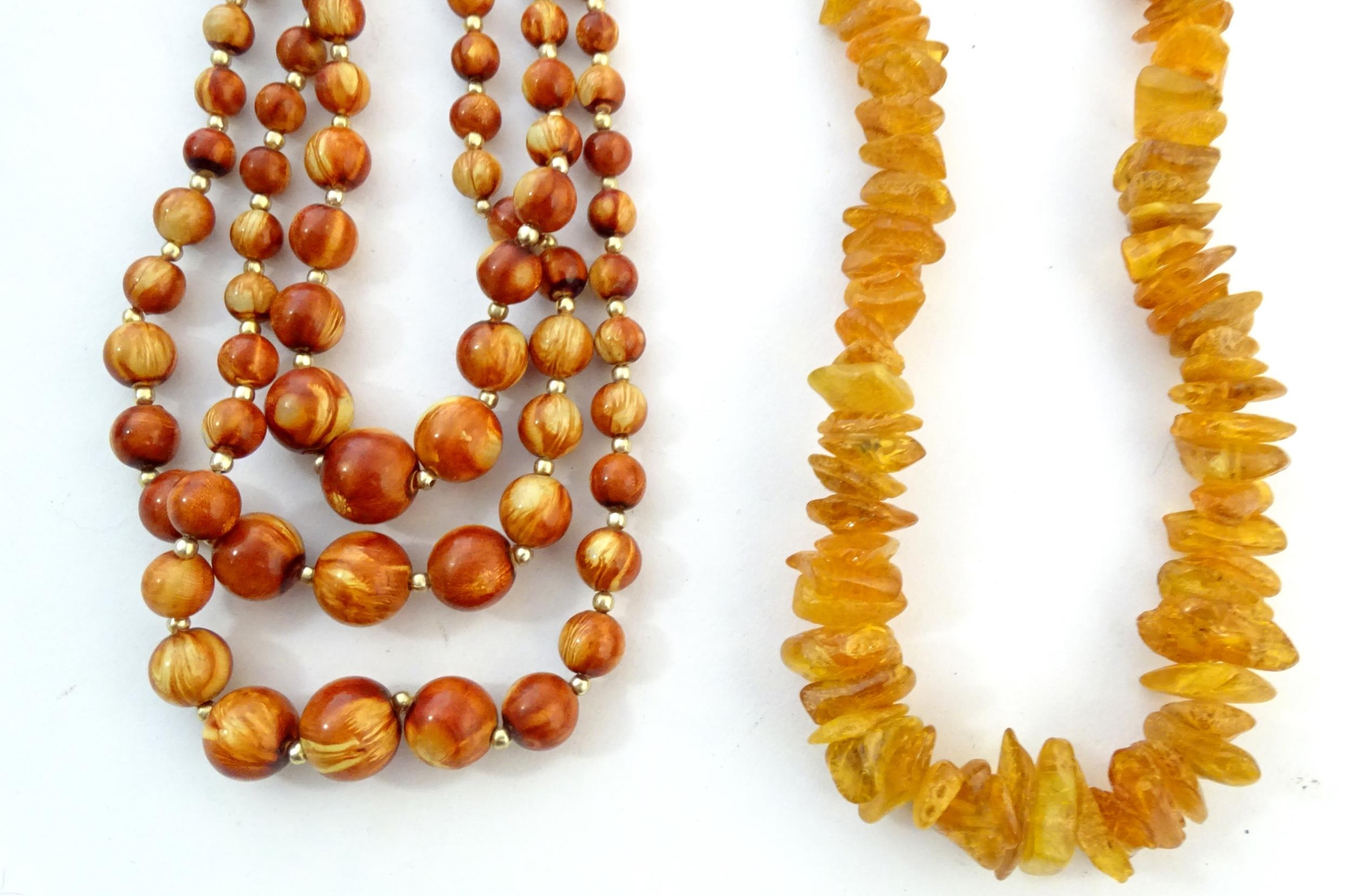 A quantity of assorted bead necklaces to include some amber examples. Please Note - we do not make - Bild 12 aus 16