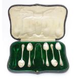Five silver coffee spoons with sugar tongs en suite hallmarked Sheffield 1913, maker Mappin &