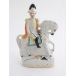 A 19thC Staffordshire pottery equestrian figure depicting Marshal Marie Edme Maurice de MacMahon,