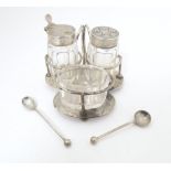 A silver cruet stand with salt, mustard and pepper, hallmarked London 1904, maker Hukin & Heath