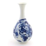 An Oriental blue and white bottle vase with a flared rim decorated with two women and children in an