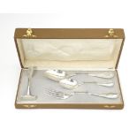 A German .800 silver christening set comprising spoons and fork. Marked N. W. Albers. Cased. Case