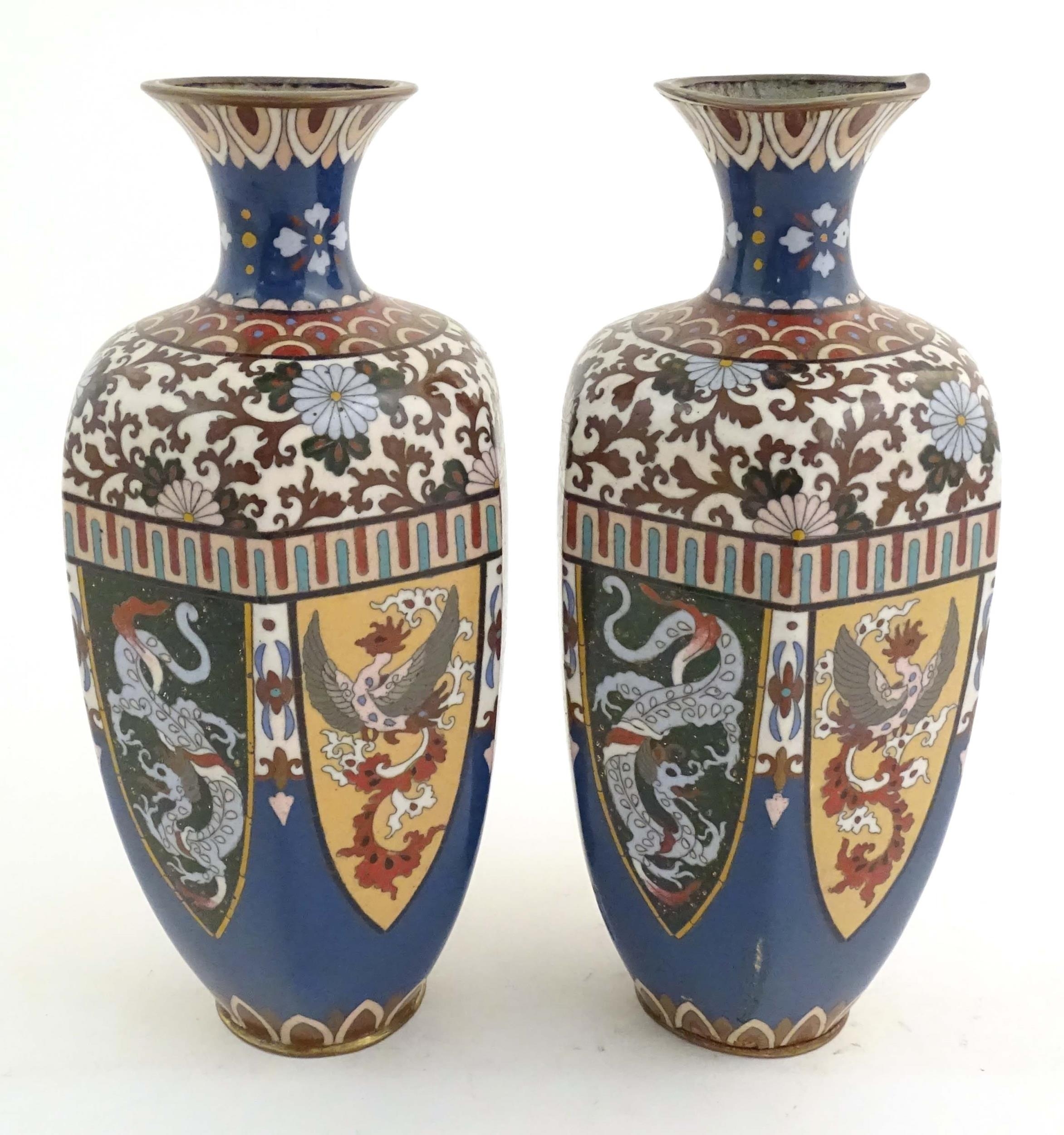 A pair of Oriental cloisonne vases decorated with panels of dragons and phoenix birds, the shoulders - Image 5 of 7